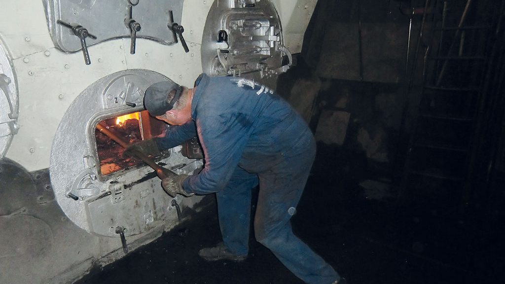 Der Heizer auf dem Dampfeisbrecher Stettin